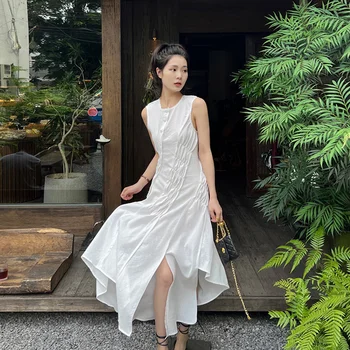Элегантная и утонченная длинная юбка в стиле богини с плиссированным рисунком и нерегулярным подолом. Белое платье для весенней женской одежды
